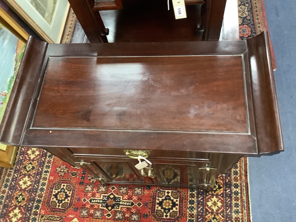 A 20th century Chinese hardwood low cabinet, with brass-fitted drawer and cupboard, width 74cm depth 36cm height 75cm